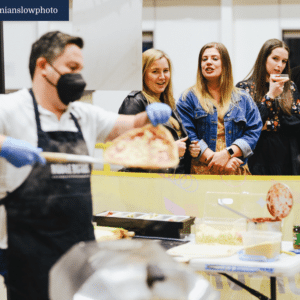 pizza chef cooks pizzas for corporate work event